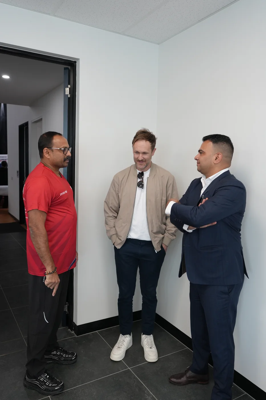 Clint in conversation with the WBi President and a tournament sponsor
