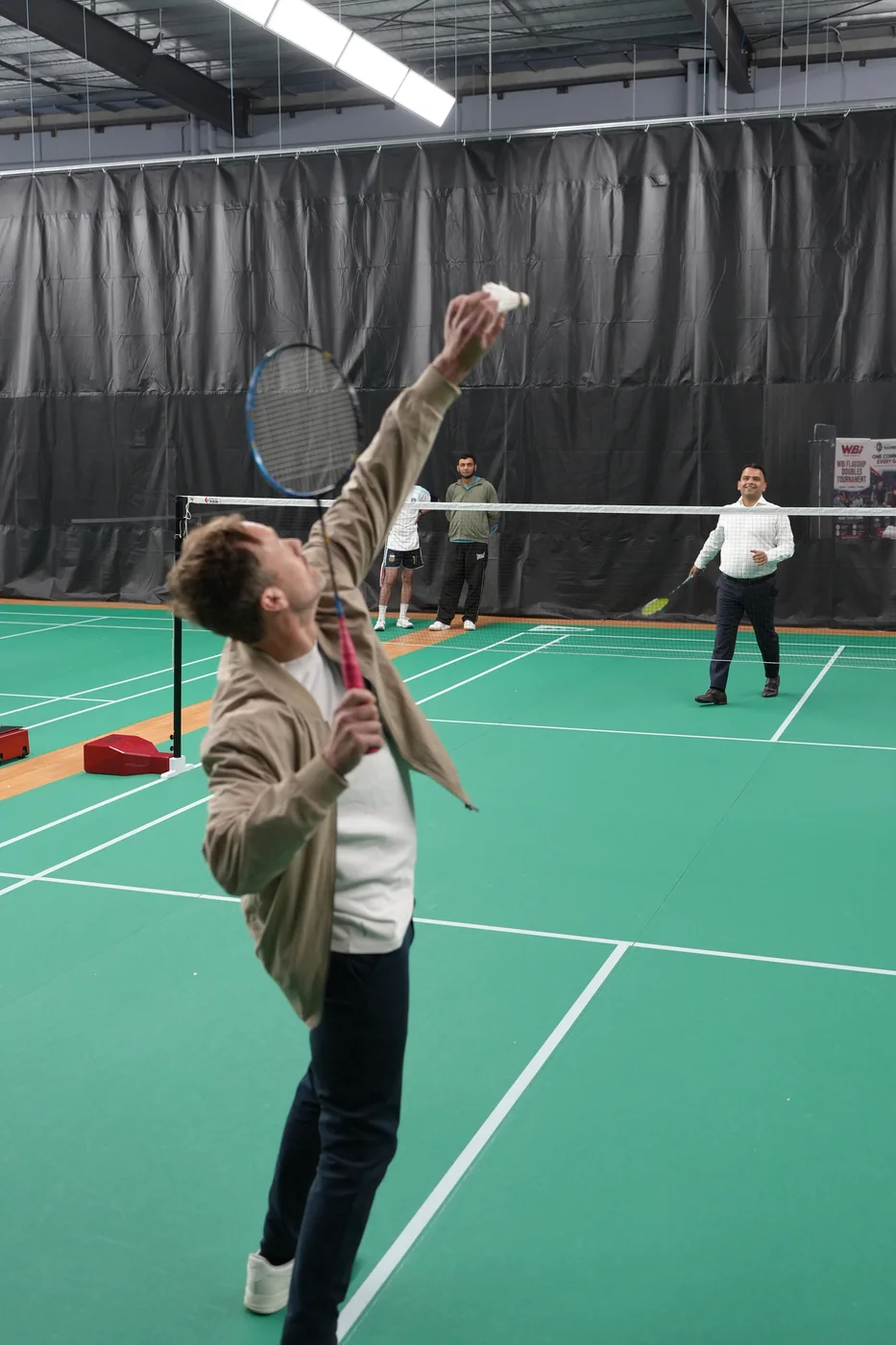 Clint enjoying a rally on the badminton court